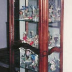 Solid Wood Curio With Cherry Stain