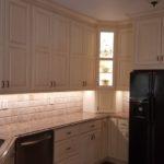 Raised Panel Cabinetry With Lighting